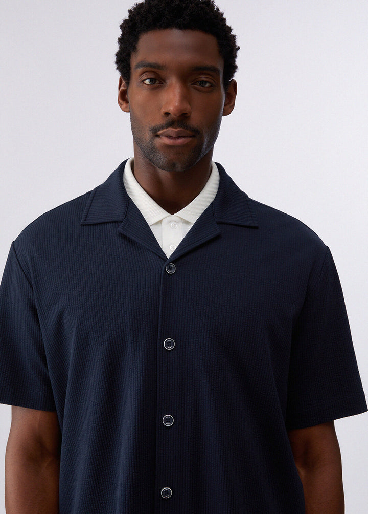 Camicia martellata LIU-JO Bowling Fit con collo classico e dettagli eleganti, tessuto morbido e stile casual raffinato.