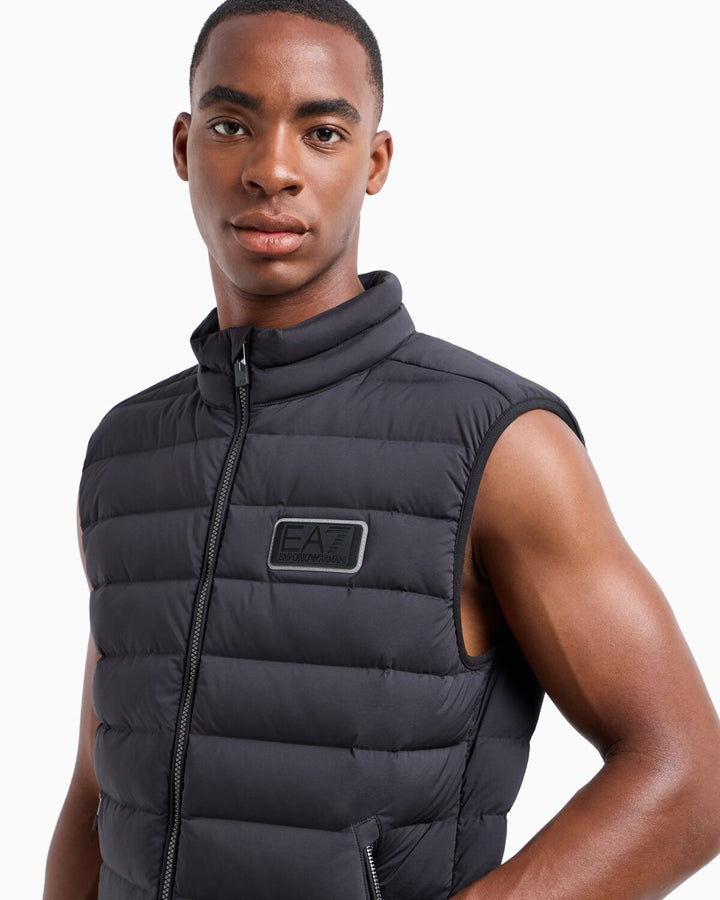 EMPORIO ARMANI EA7  Piumino Smanicato Logo Gommato Uomo |  JEK PIT