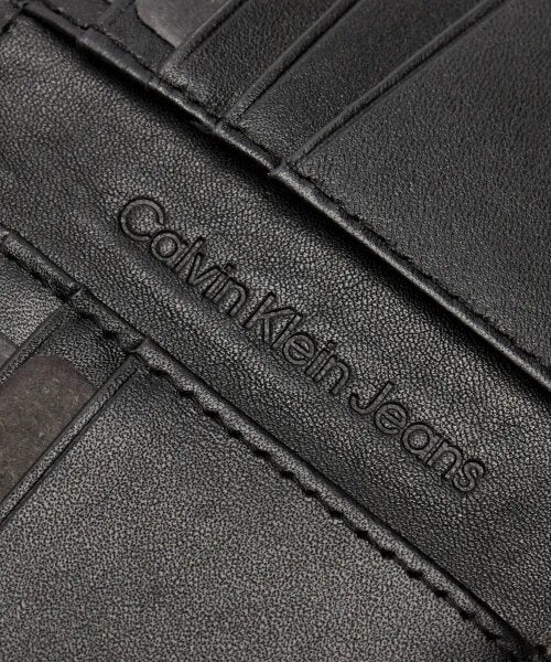 CALVIN KLEIN  Portafoglio Emboss Bifold Allover Uomo |  JEK PIT