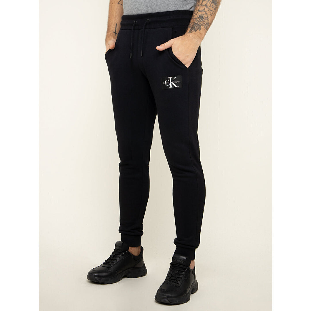 CALVIN KLEIN  Pantalone In Felpa Con Logo Ricamato Uomo |  JEK PIT
