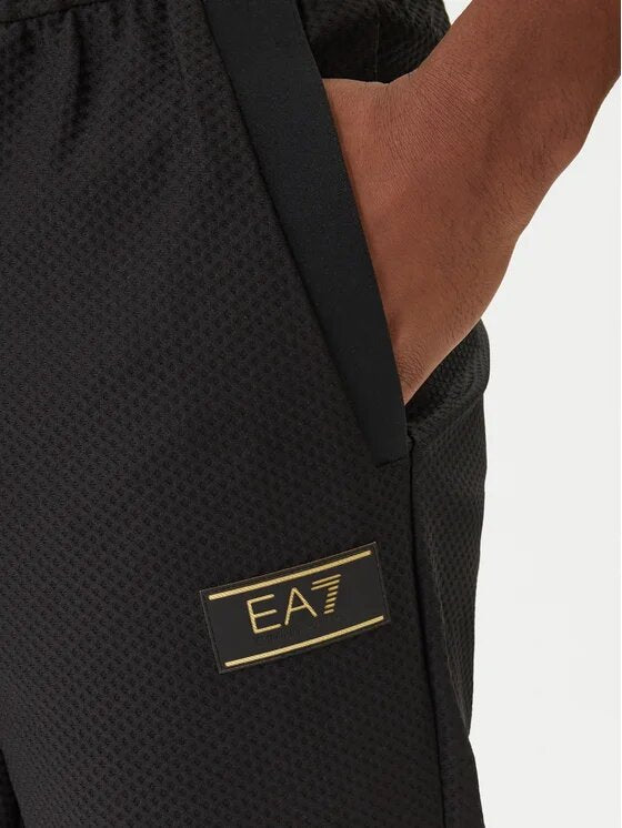 EMPORIO ARMANI EA7  Pantalone Con Logo Dorato Uomo |  JEK PIT