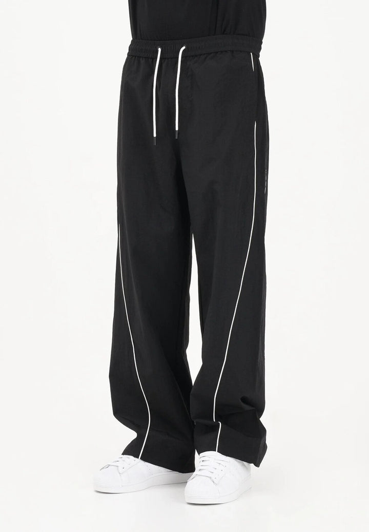 TOMMY JEANS  Pantalone Theo Parachute Track Uomo |  JEK PIT